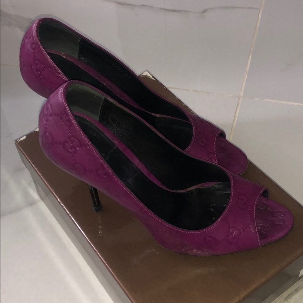 Gucci plum color with black heel